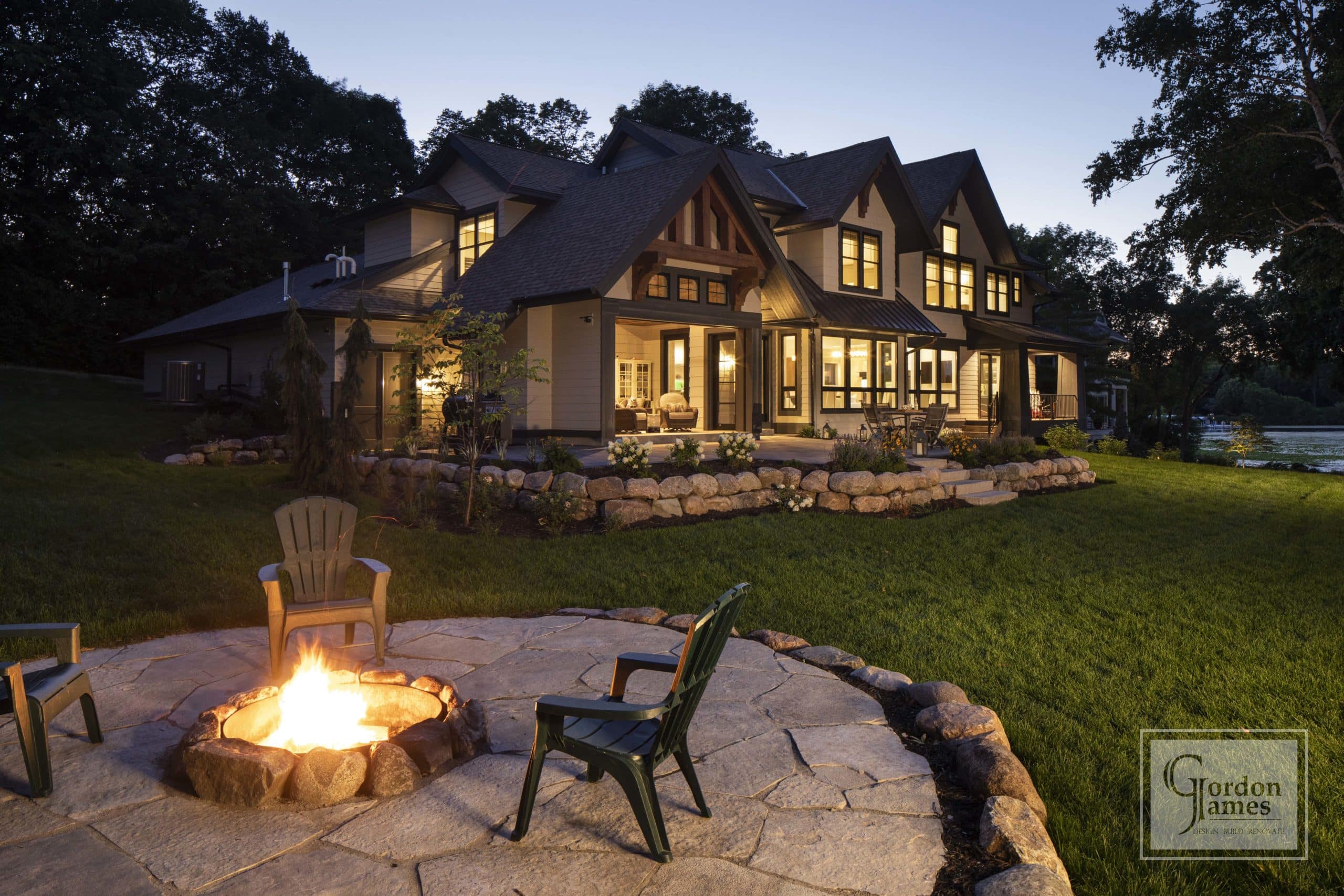 lakefront home with fireplace