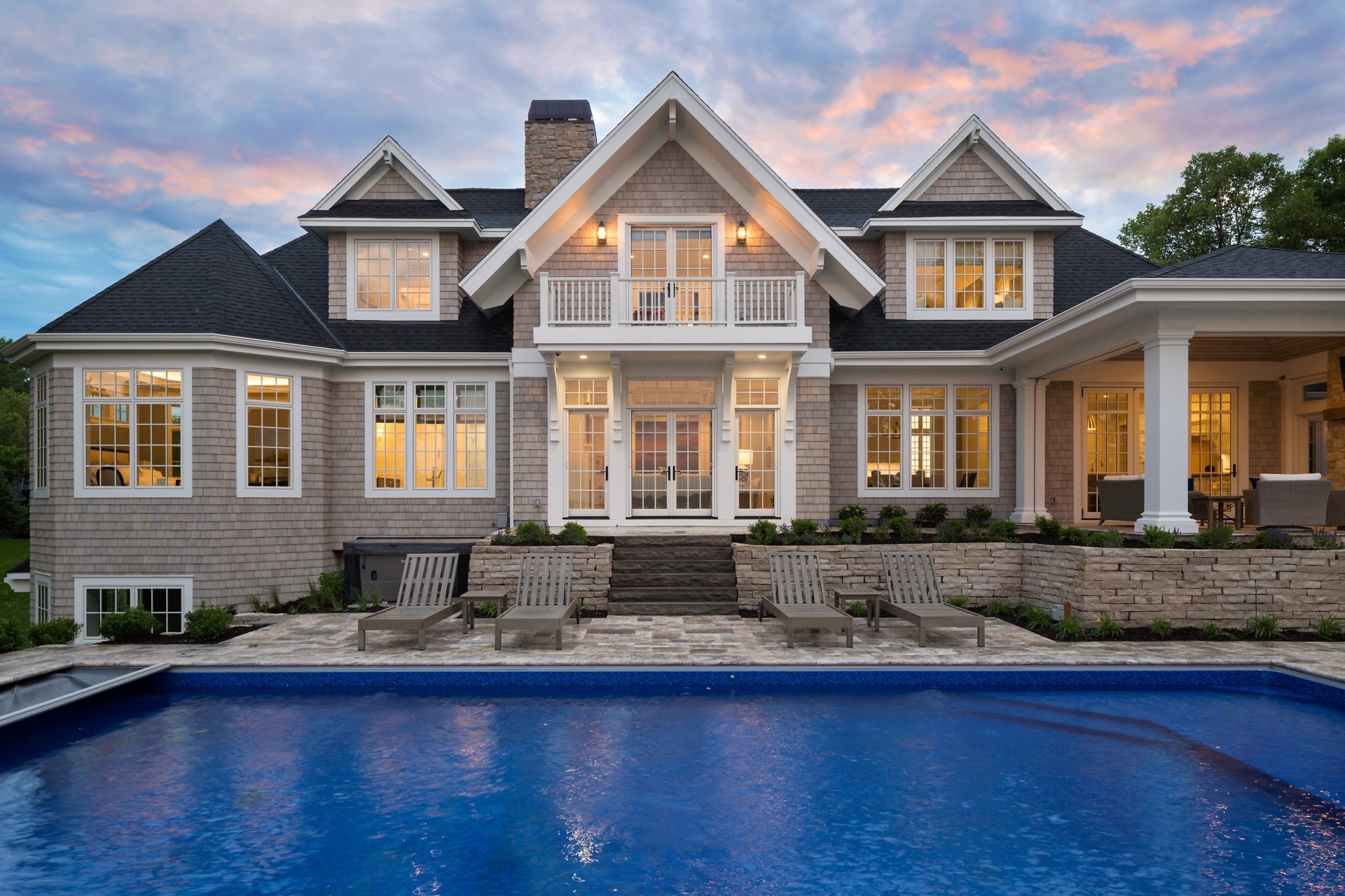 A Gordon James luxury custom built home with an outdoor pool in Minnesota.