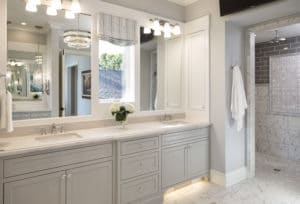 Artisan white tile bathroom with Ferguson custom home plumbing installed in Wayzata 