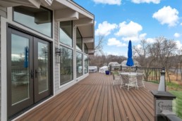 The patio of this custom-built Gordon James home offers a breathtaking view of nearby Shaver's Lake in Wayzata, Minnesota
