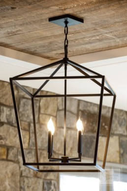 Modern Matte Black Brass Suspended lantern in Gordon James luxury home