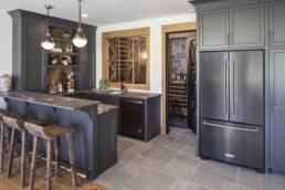 European farmhouse basement kitchen and bar custom build by Gordon James in Minnesota